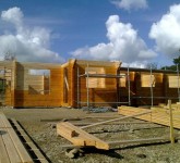 Delivery and construction of log house with planning permission for wind turbine