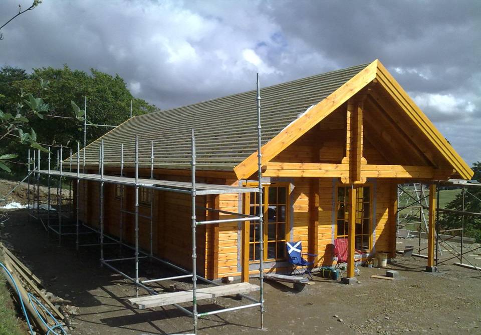  construction of log house with planning permission for wind turbine